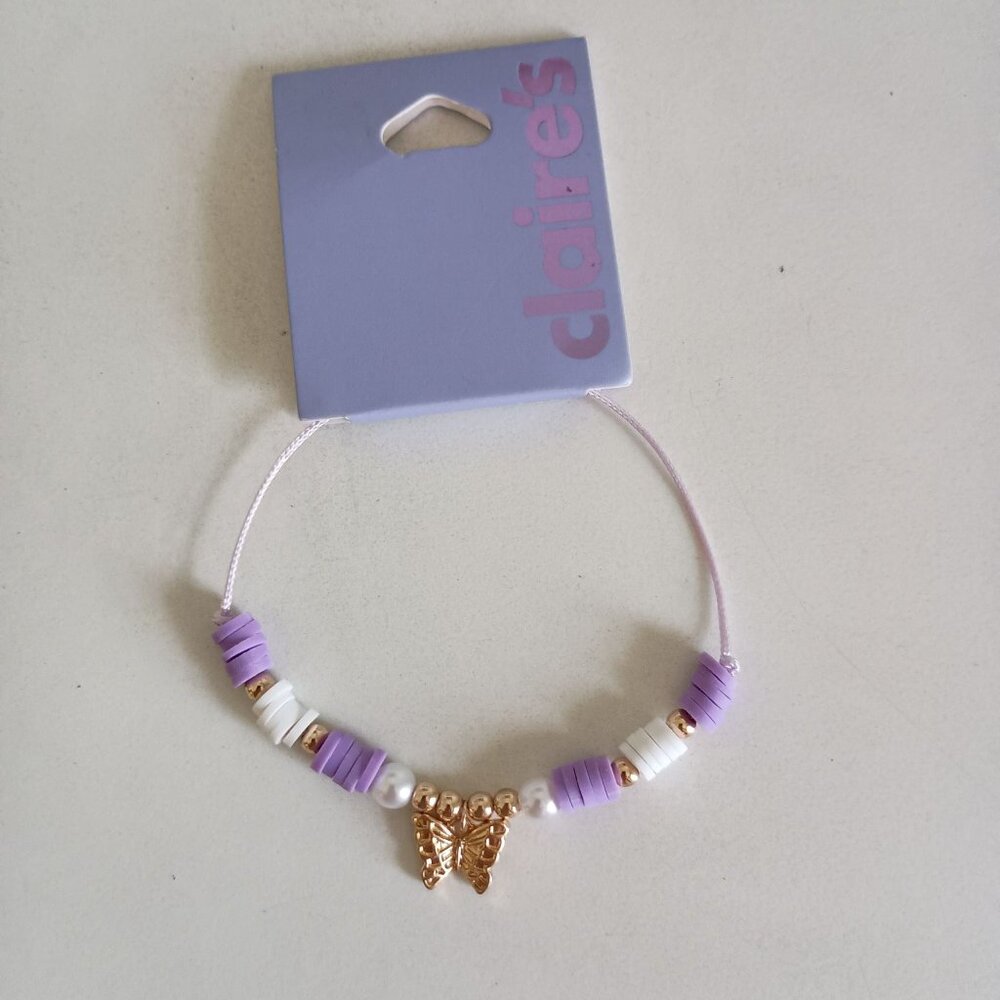 NWT Claire's dainty purple and white disc beads golden butterfly charm bracelet